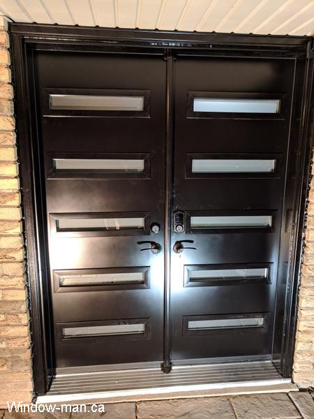 Double front black exterior doors installation. Modern stylish shaker style. Acid etched glass. Privacy Glass. 5 lite. Professionally installed. Ruth retro collection